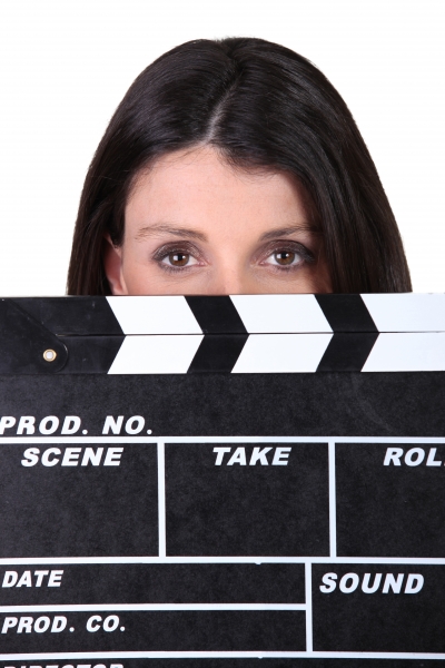 3521115-woman-holding-movie-clapper